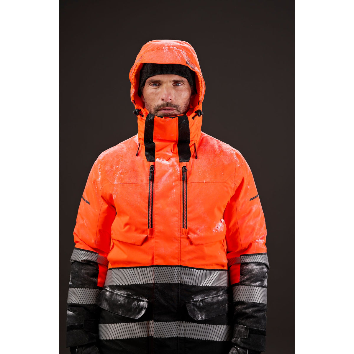 Portwest EV4 EV401 Hi-Vis Waterproof Expedition Parka Jacket in Orange/Black, worn by a model