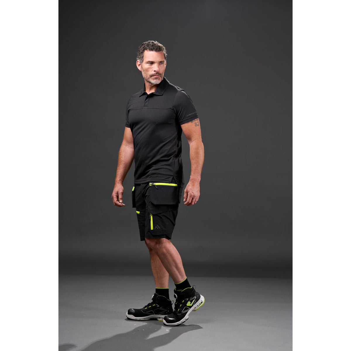 Portwest EV4 EV444 Lightweight Stretch Holster Work Shorts in Black, worn by a model