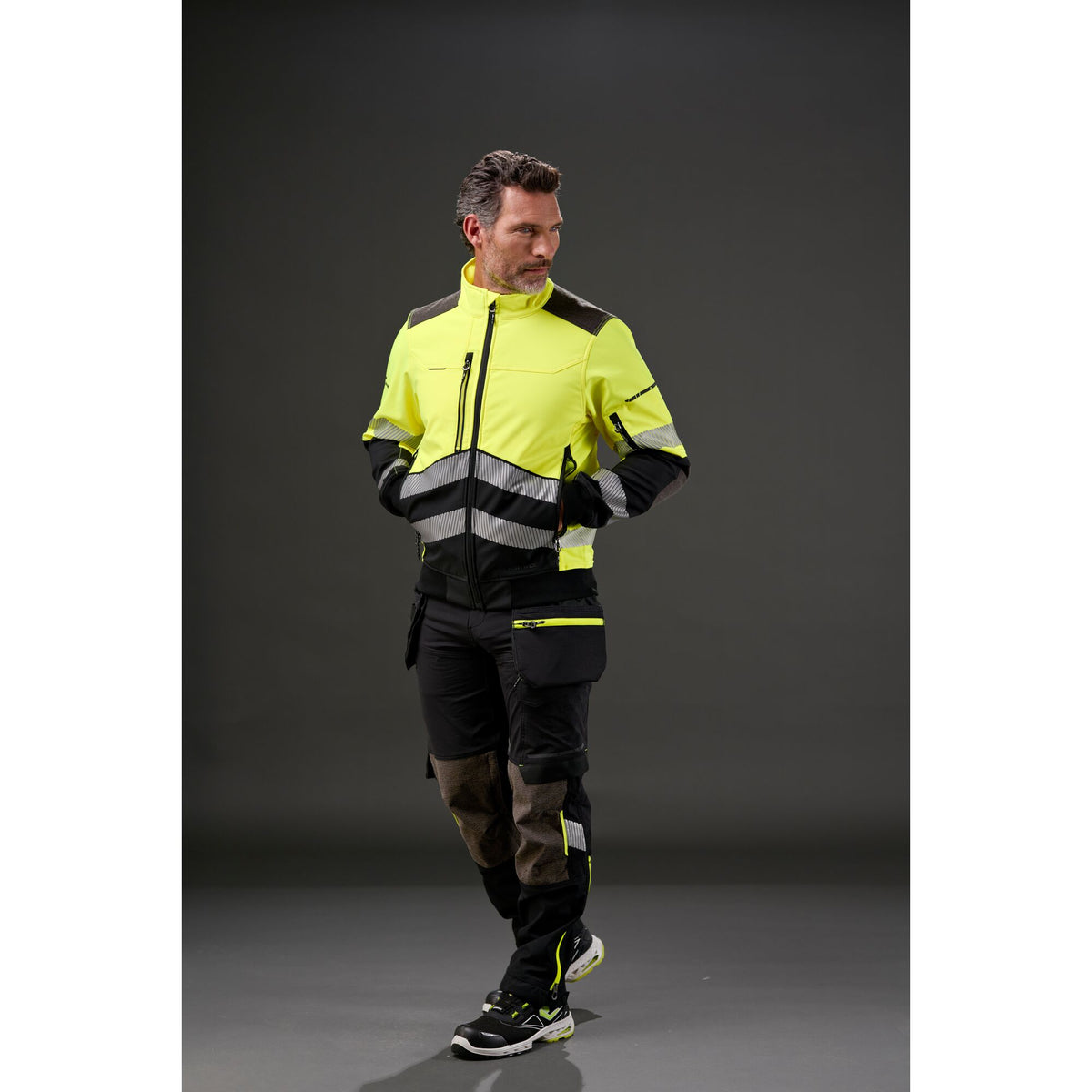 Portwest EV4 EV447 Water Repellent Stretch Holster Work Trousers in Black, worn by a model