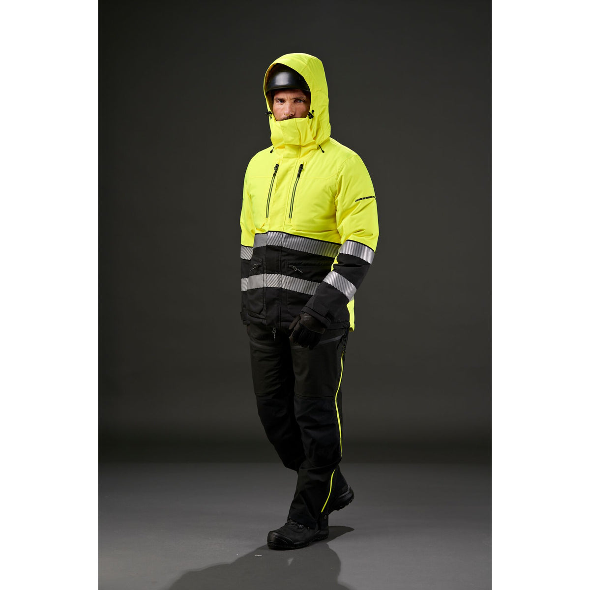 Portwest EV4 EV467 Hi-Vis Class 3 Waterproof Winter Jacket in Yellow/Black, worn by a model